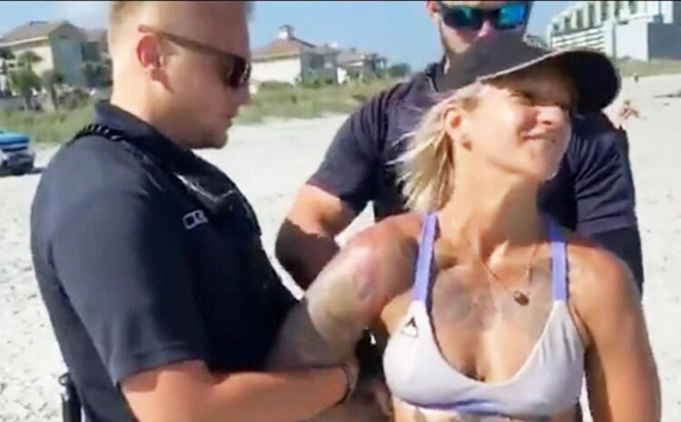 Cops Had To Drag This Acrobat Off the Beach After Someone Complained About Her Bikini…